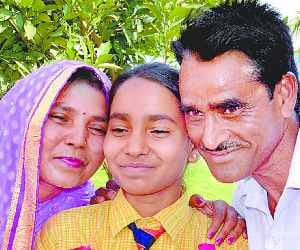 Farmer's daughter Soumya High school state topper
