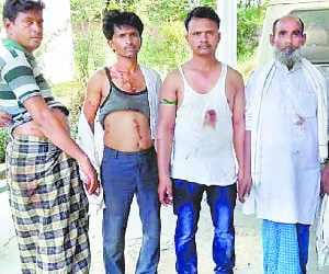 firing in pond dispute, nine  injured