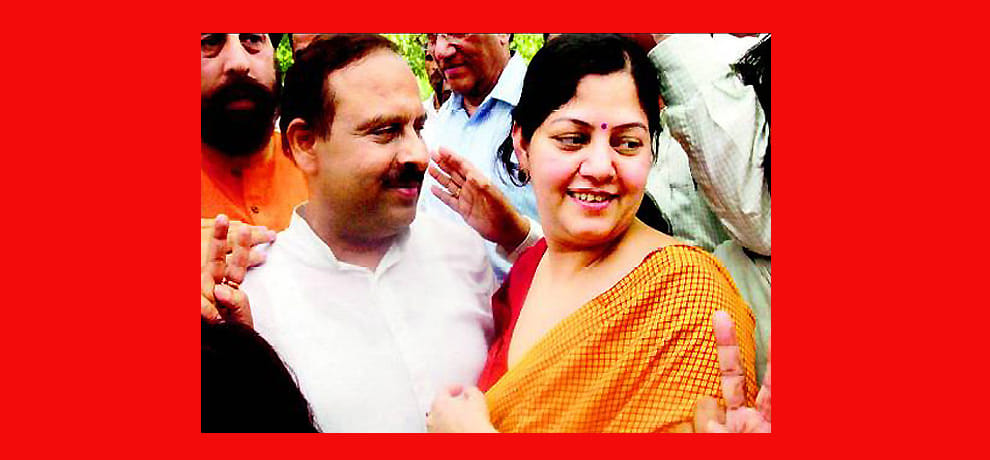 aap accused bjp leader wife to corruption in old age pension 