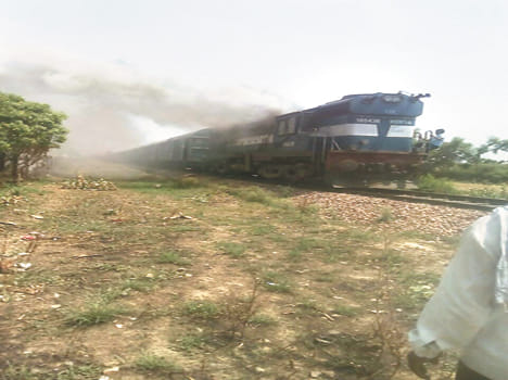 Goods train engine on fire, stirring