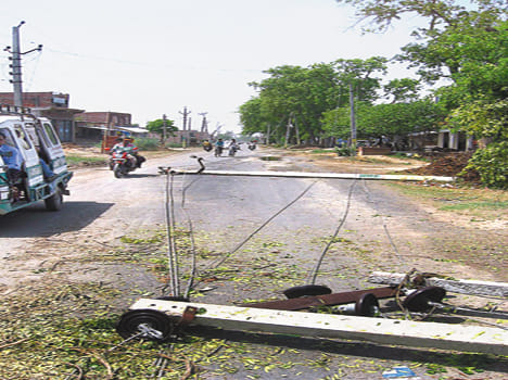 strong winds damaged power pole and wires