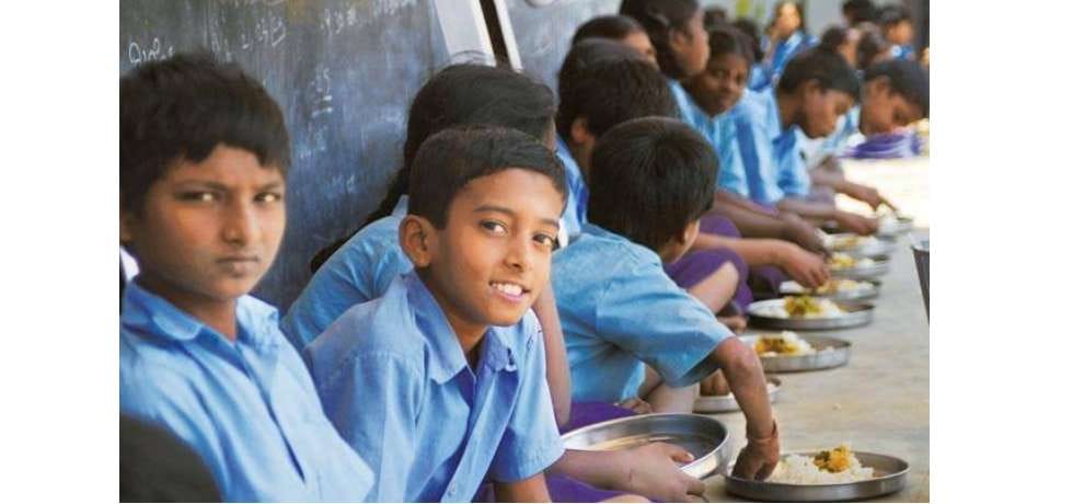 kari and rice served to school children in mid day meal at Delath school