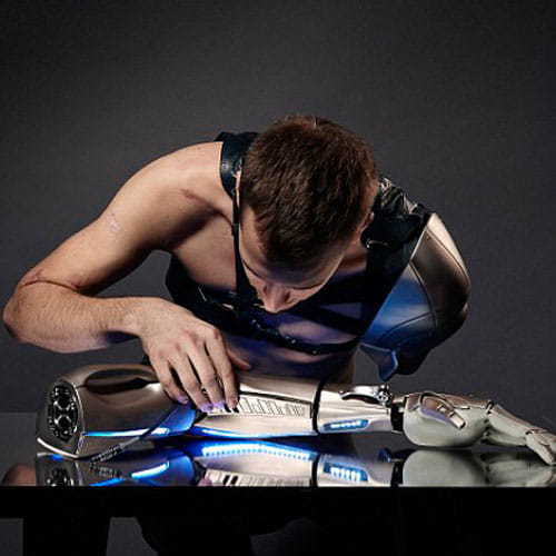 man with amazing arms including torch and charger