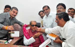Candidate at the party celebrating the House to Revathy