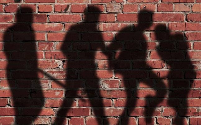 Policemen beaten up, tried to rob rifle