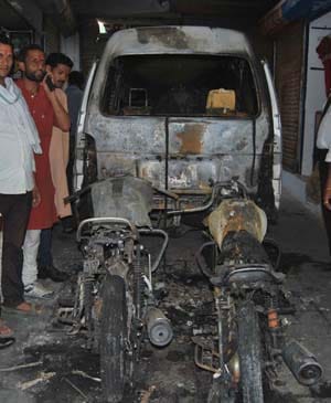 Naughty Ttwoen handiwork of two bikes and the car burned