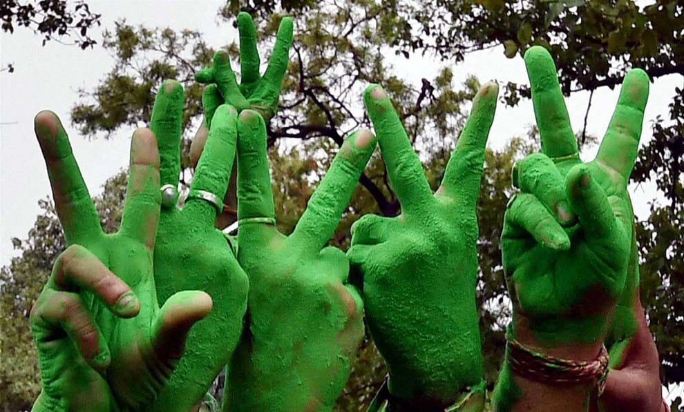 tmc and AIADMK supporters celibrate