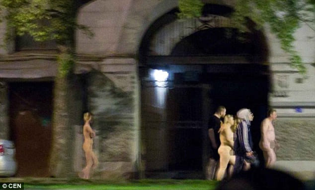 The ultimate walk of shame in the streets of St Petersburg after police raid a brothel