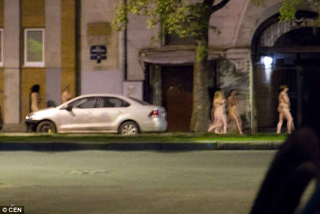 The ultimate walk of shame in the streets of St Petersburg after police raid a brothel