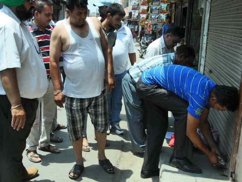 property tax raid, shop seal, pathankot