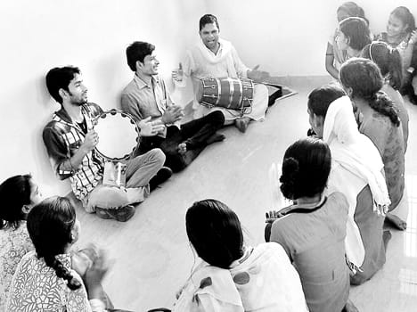 The children learned the tricks of staging drama