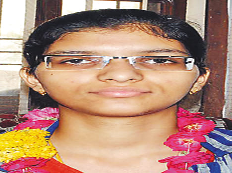 astha becomes district topper