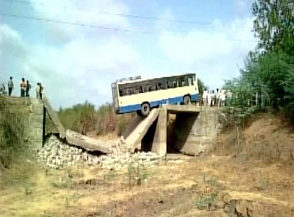 bus dangles at the tip of a collapsed bridge in Junagadh Gujarat