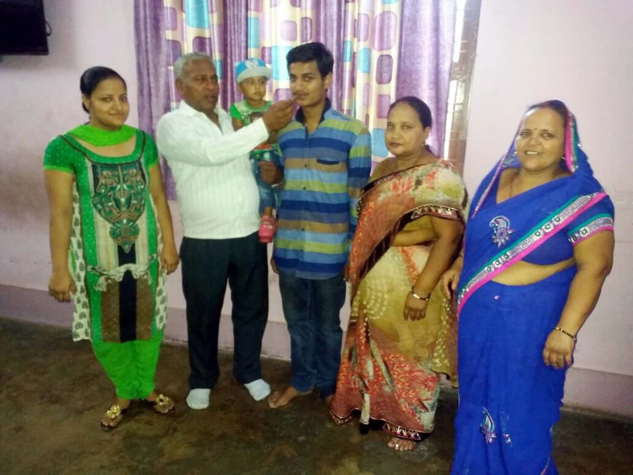 Hemanth Gowda became district topper.