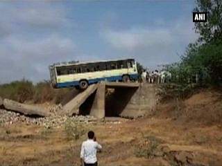 Bus gets suspended freely on bridge, passengers saved miraculously