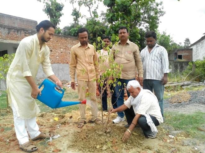 Planting a sacred work: Dharnidhar