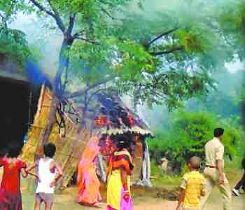 shed burned in front of the police