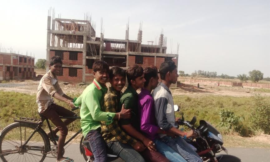 Five on the bike, along with bicycles