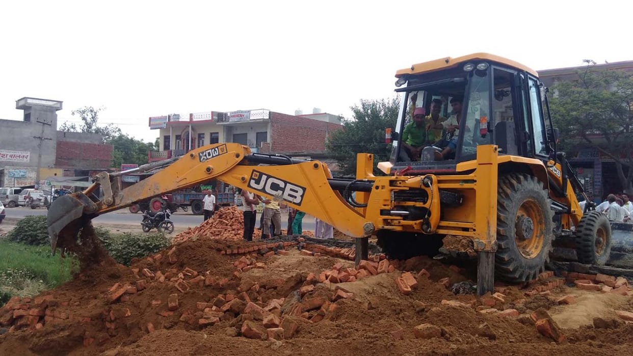 demolition of illegal constructions on pond