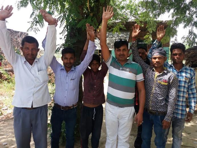 Demonstrated by his party workers