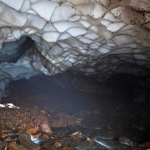 a beautiful ice cave in russia
