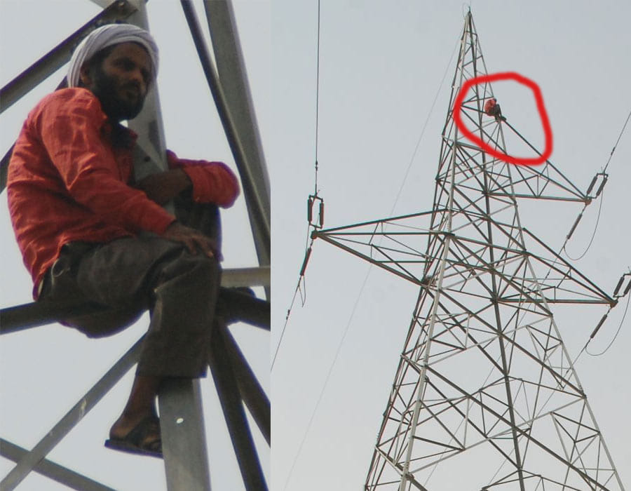 Man climbed on electric tower for search his missing wife.