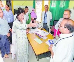 Patients were suffering in the heat without fans.