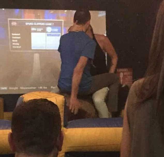 awkward intimacy of couples in public place