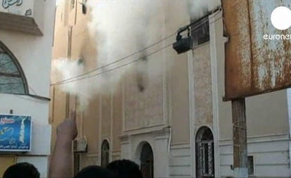mob strips, beats parade elderly woman through streets, torches Christian 