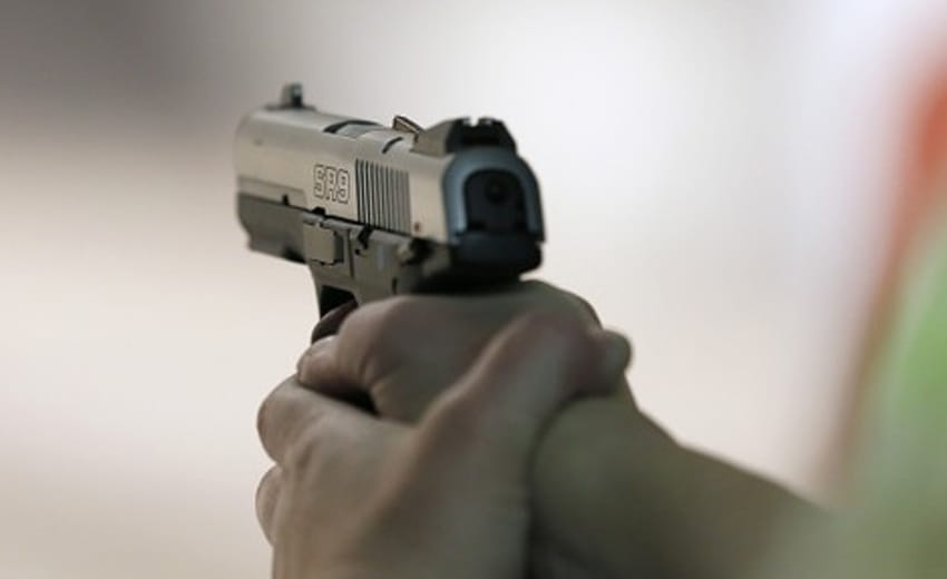 A man caught with a gun near governor house.