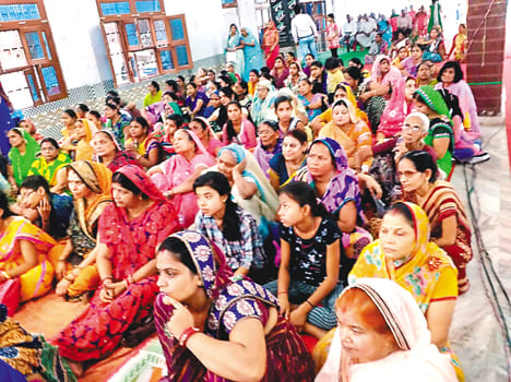 devotees gathered ion bhagwat katha
