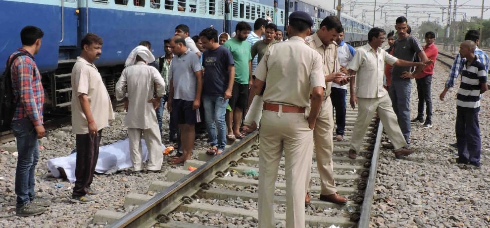 The young man's body was found on the railway tracks, murder suspected