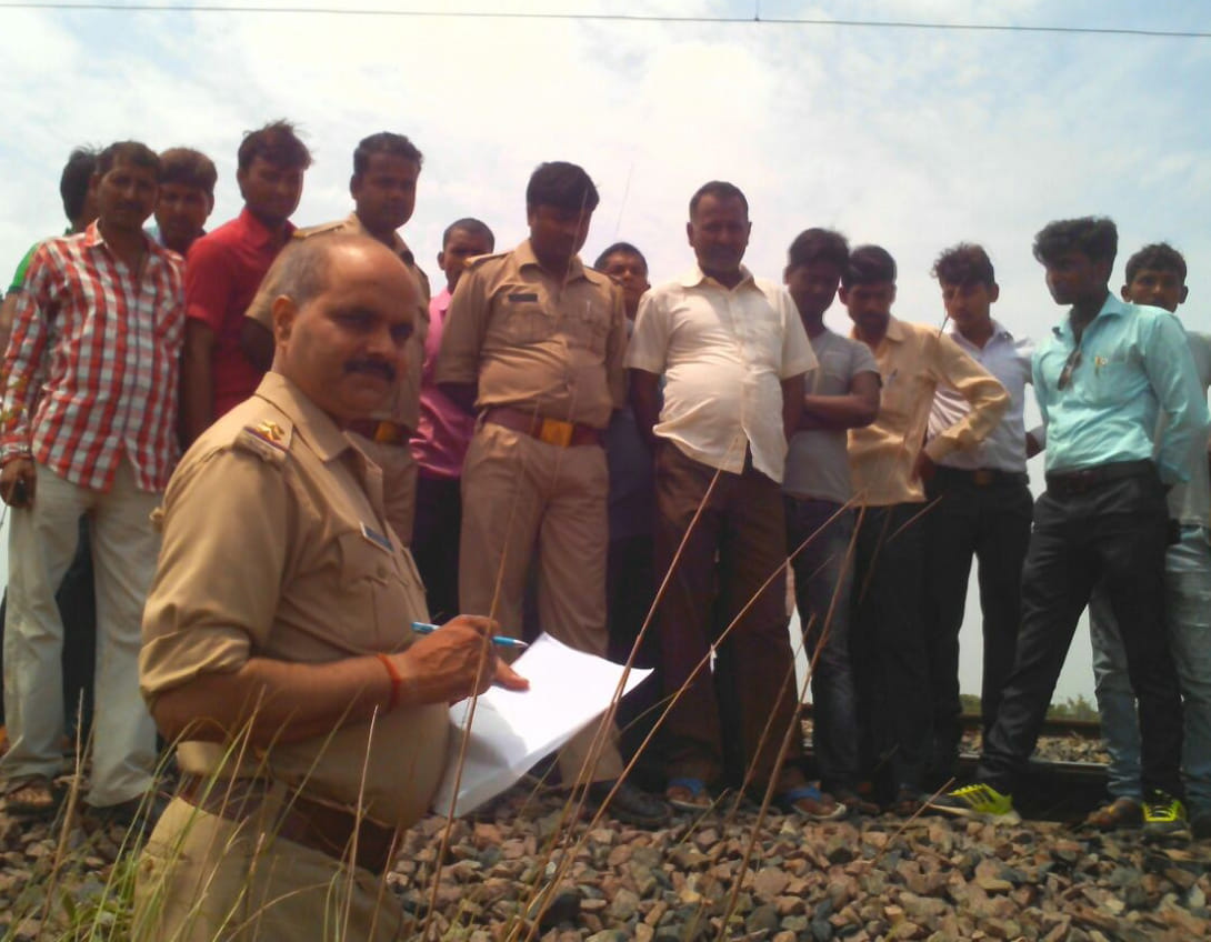 student pair crushed under train