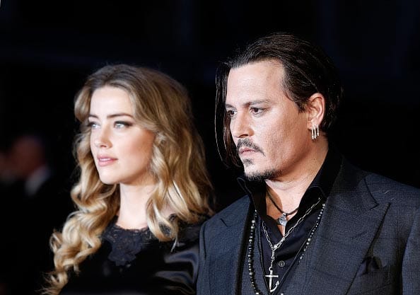 Johnny Depp has been ordered to stay away from his wife Amber Heard 