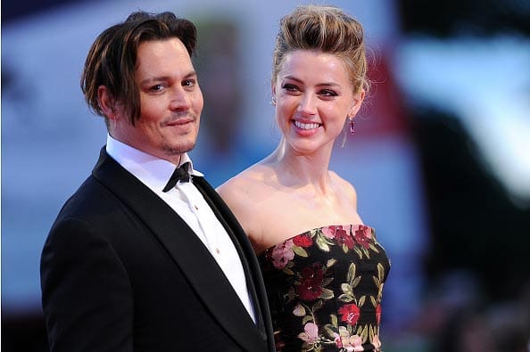 Johnny Depp has been ordered to stay away from his wife Amber Heard 