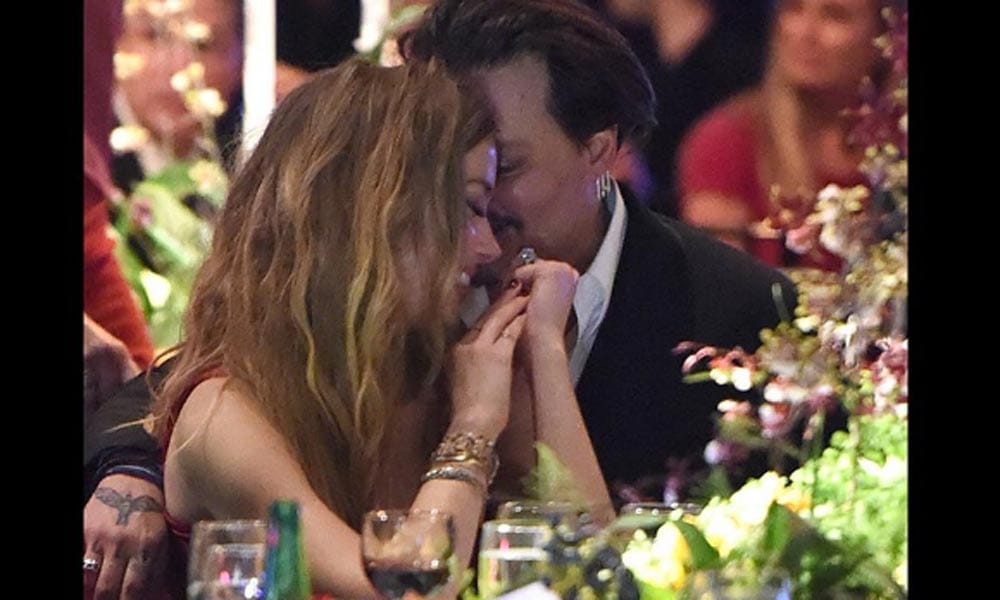Johnny Depp has been ordered to stay away from his wife Amber Heard 