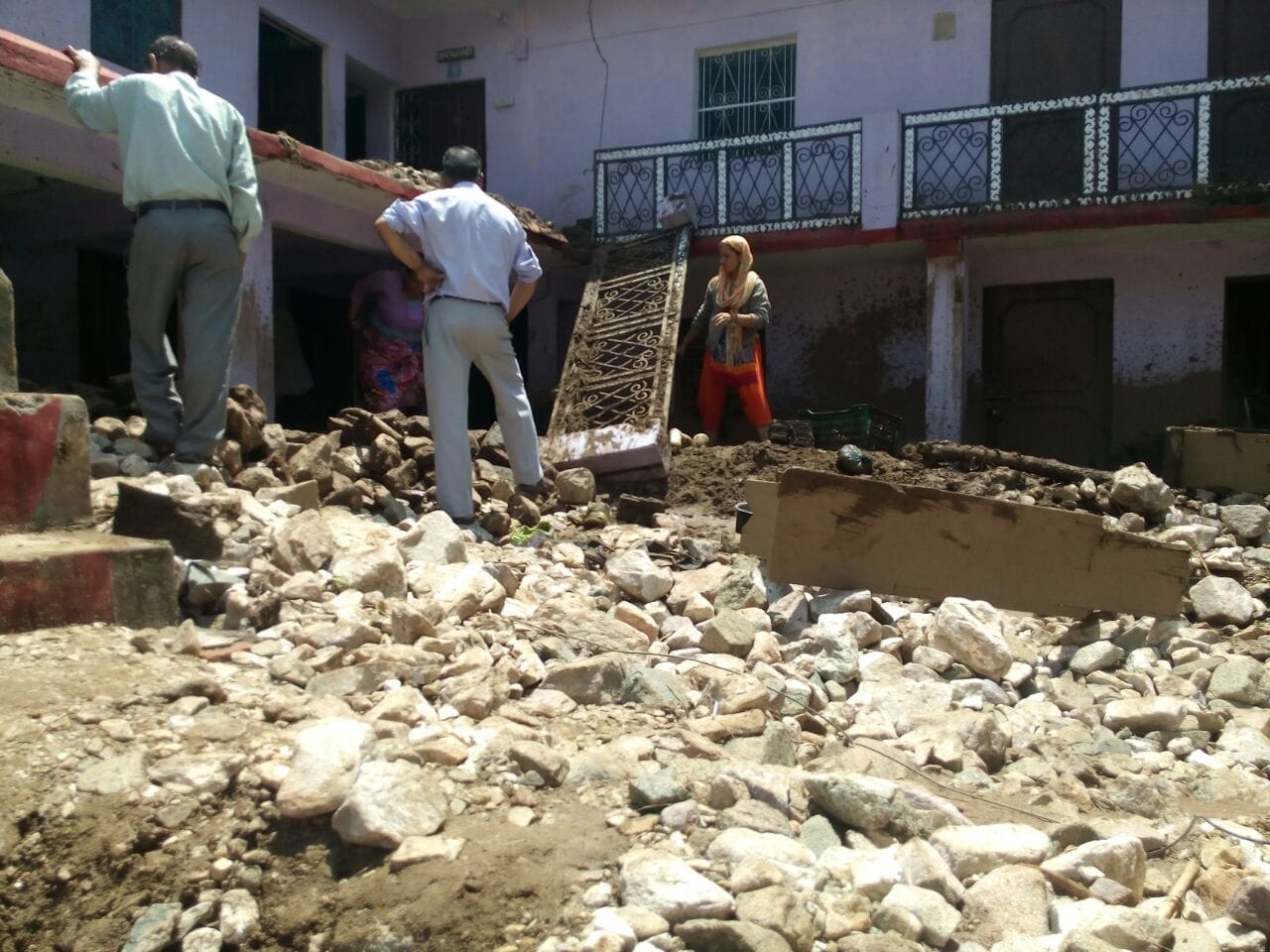 people search their luggage in ghansali cloudburst area