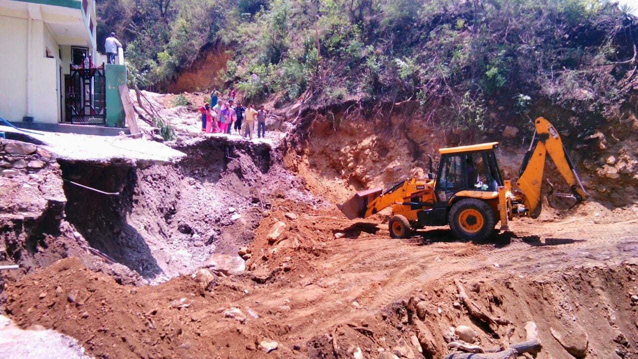 people search their luggage in ghansali cloudburst area