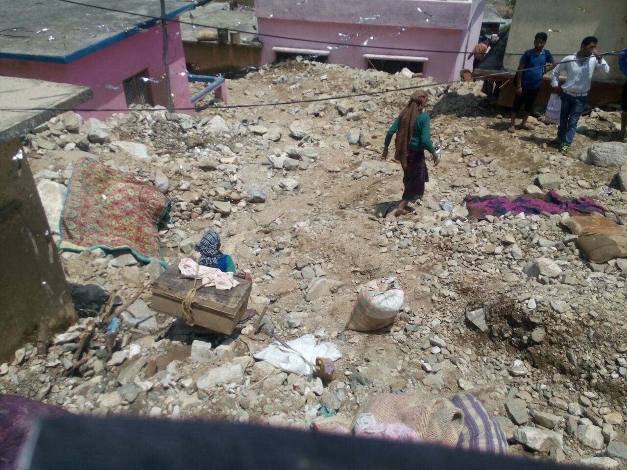 people search their luggage in ghansali cloudburst area
