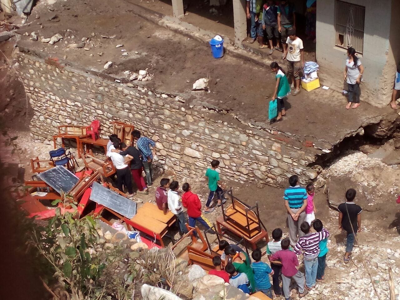 people search their luggage in ghansali cloudburst area