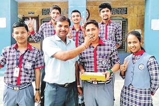 student celebrate her success