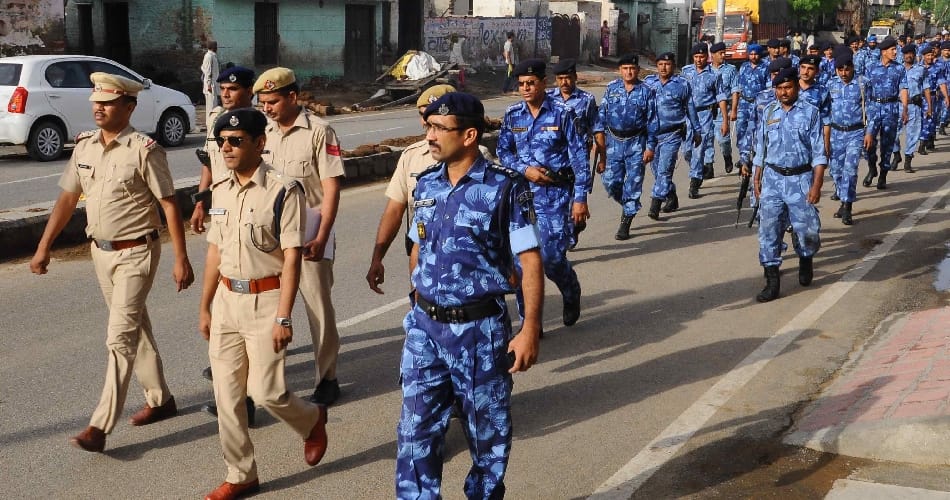 jat andolan, jat reservation, bsf, para military force, flag march, sonipat, jind, rohtak, haryana