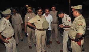 Killing five persons, including inspector