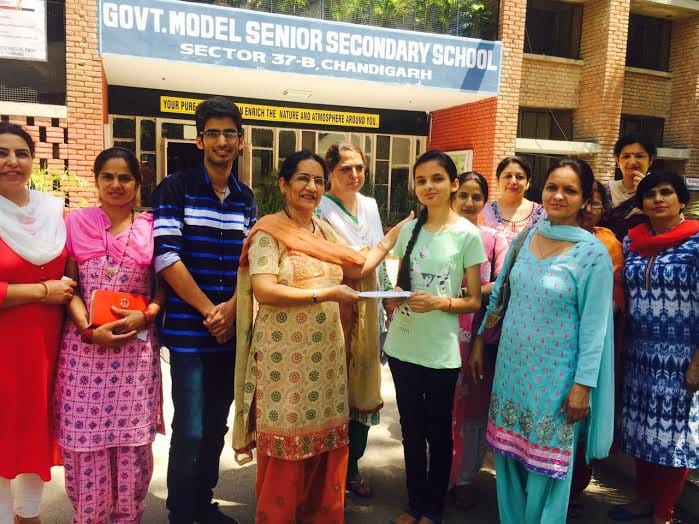toppers, canada resident give scholarship, deepak tiwari, rashi sharma, chandigarh