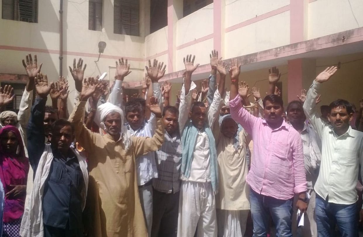 Villagers protesting against Encroachment