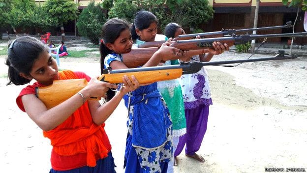In Banaras women 's train by arms