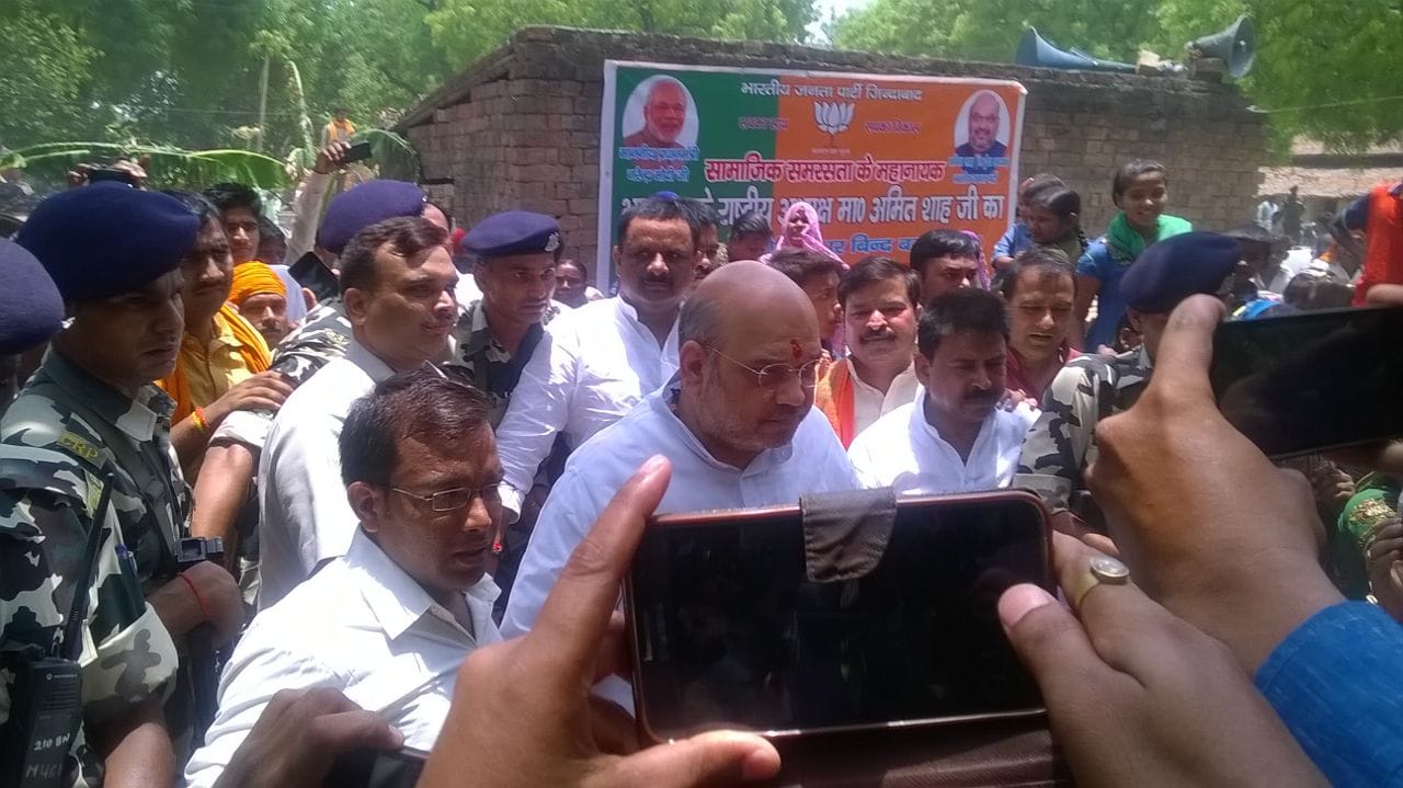 bharatiya janata party's president ami shah's lunch with dalits in varanasi uttar pradesh