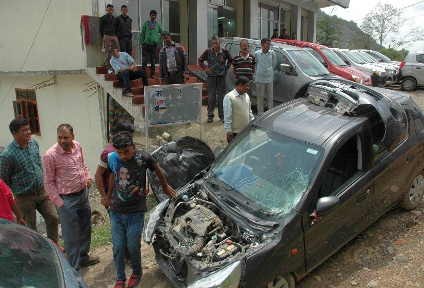 Car damaged by falling boulders