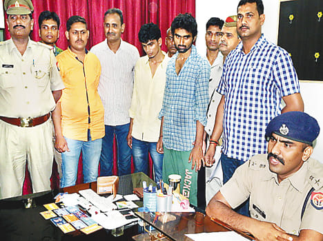 The two were arrested blow millions of ATM fraudsters