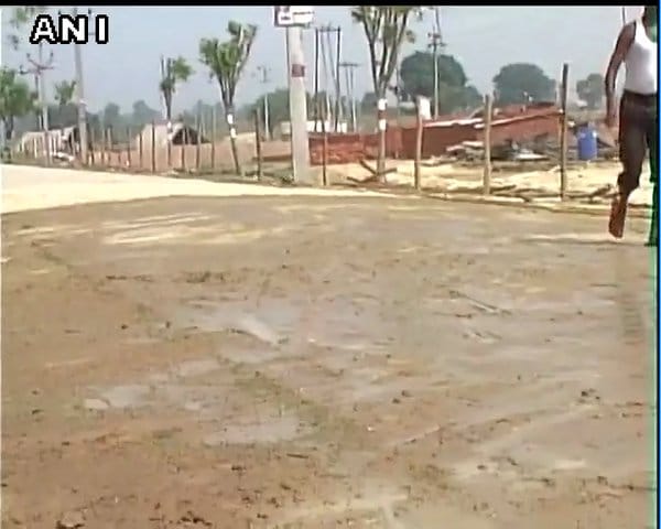  Water being used to settle dust at CM Akhilesh Yadav's venue in Barabanki's Fatehpur town.